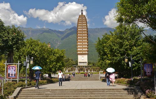 Pagoda tower with trees mostly covering two other towers